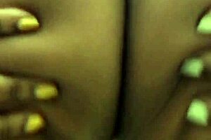 Black woman and revealing clothing attractive and sexually explicit removing clothing in public toilet