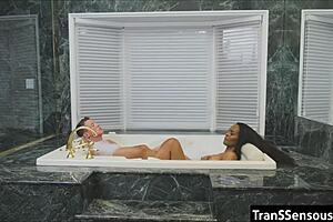 In this interracial scene, an ebony shemale gets fucked by a black guy in a crossdressing setup.