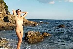 Latina Inserts Pebbles on Naked Public Beach