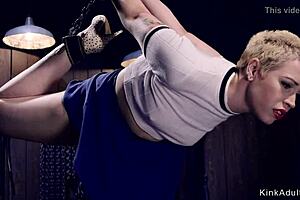 blonde slave in gas mask gets whipped, gagged, bound, and choked in kinky bondage