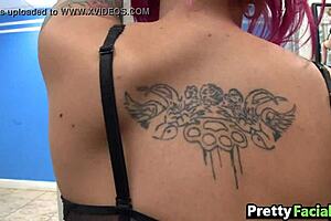 Girl with pink hair getting a cum facial