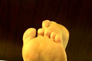 co worker rubs her high arch feet while masturbating