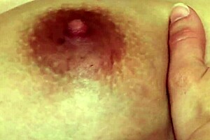 A guy oils up the pregnant brunette's belly and slides his cock into her pussy in various positions