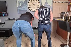 Two Amateurs Desperately Piss in Wet Blue Jeans