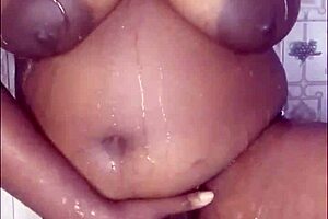 A very curvy African American woman having sex and overall feeling the music in the restroom