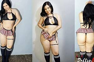 Girl in sexy student dress fucking my cock doggy style, bent over with brunette tits bouncing