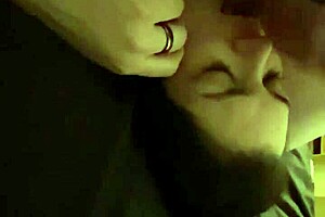 close up of tongue licking balls while laying down