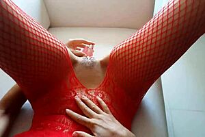 red lingerie teases with butt plug during sexy masturbation show