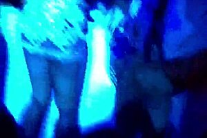 two girls perform on stage with a ciroc bottle in an amateur show