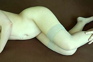 I give sexy milf legs a tickling massage in nylon stockings