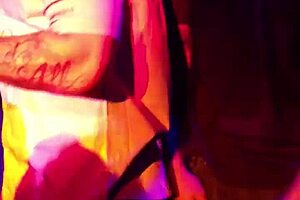 two girls perform on stage with a ciroc bottle in an amateur show