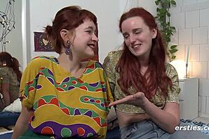 Horny redheaded lesbians lick each other to climax with toys