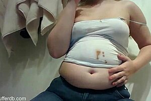 Hey, this chubby blonde slob is so messy with chocolate! 😋