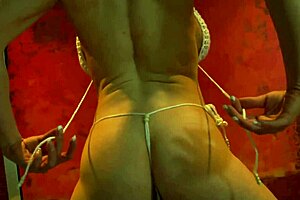 Muscular Redhead Bodybuilder Shows Off Big Fake Tits in Tiny Bikini