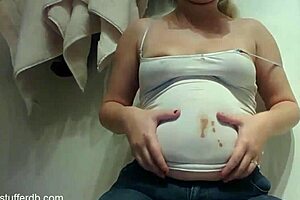 Hey, this chubby blonde slob is so messy with chocolate! 😋