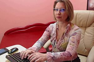 Mature secretary teases body and jerks off instructions