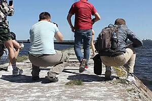Naked Woman Poses Outdoors On Public Dock In Reality Video