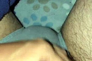 A man wakes up in the midnight with his horn standing and he starts rubbing it and ejaculating in his pants