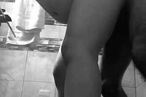 Latina couple has a quick fuck in the bathroom