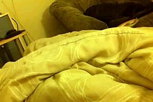 In the bedroom, he wanks his long thin cock to a massive cumshot