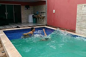 Caught The Pregnant Babe Bent Over In The Pool?