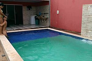 Caught The Pregnant Babe Bent Over In The Pool?