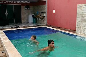 Caught The Pregnant Babe Bent Over In The Pool?