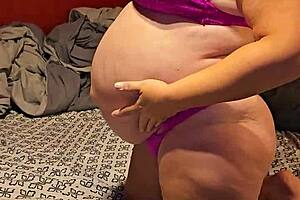 Milf giving blowjob in pink outfit with big ass