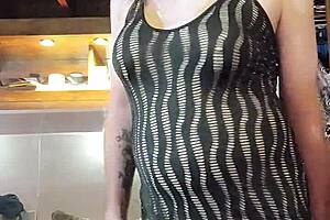 Naughty Brunette Ladyboy Models Dresses in Solo Crossdressing Fun