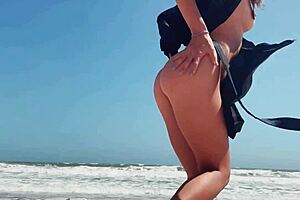 teen girl teases on nude beach while guy jerks off secretly