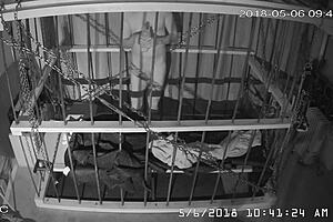 Intense cage bondage for gay slave, bound tightly in the cage