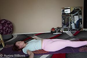 Yoga instructor showing some special to her students