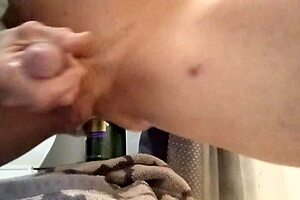 Gay bottom rides cock in ass with bareback action, tattoos, and piercings in group scene