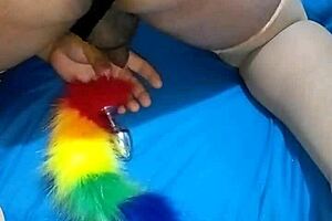 Pamelitha teases in crossdressing attire