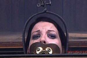 This caged babe is begging for some punishment