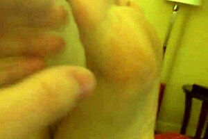 Coworker rubs high arches