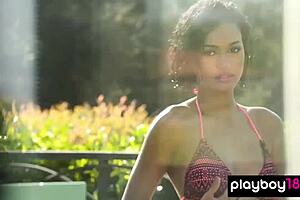 Watch This Ebony Babe Strip Naked By The Pool!