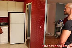 Muscular black athlete participates in interracial group activity