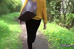 An unfaithful English MILF, Gill Ellis, flaunts her very large breasts