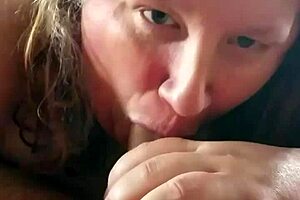 Friend's wife gives topless blowjob