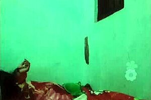 Khmer hot girl engages in detailed fucking on the bed with her friend, leading to a cumshot