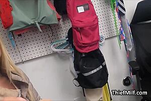 Busty blonde housewife in office with socks on