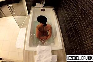 Sexy Jezebelle Bond records her steamy bath solo