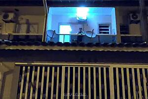 Young Married Woman Caught with Lover on Balcony