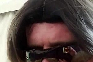 the girl in lingerie plays with dildos on her ass