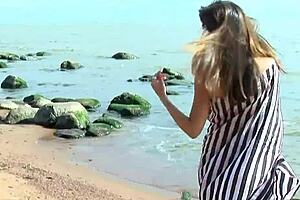 Cristelle fingers her tight pussy to orgasm on the beach