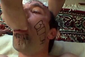 There is a man, dominated and anally penetrated by a woman with a strapon in front of his girlfriend
