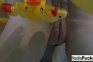 Taking an explicit shower for only Nadia and some rubber ducks