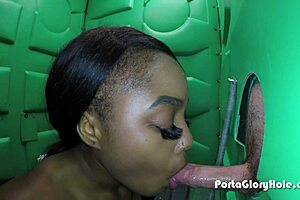Porta Gloryhole Scene with Black Girl Sucking White Guys