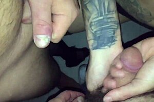 Tattoed chick sucks stranger in video booth.